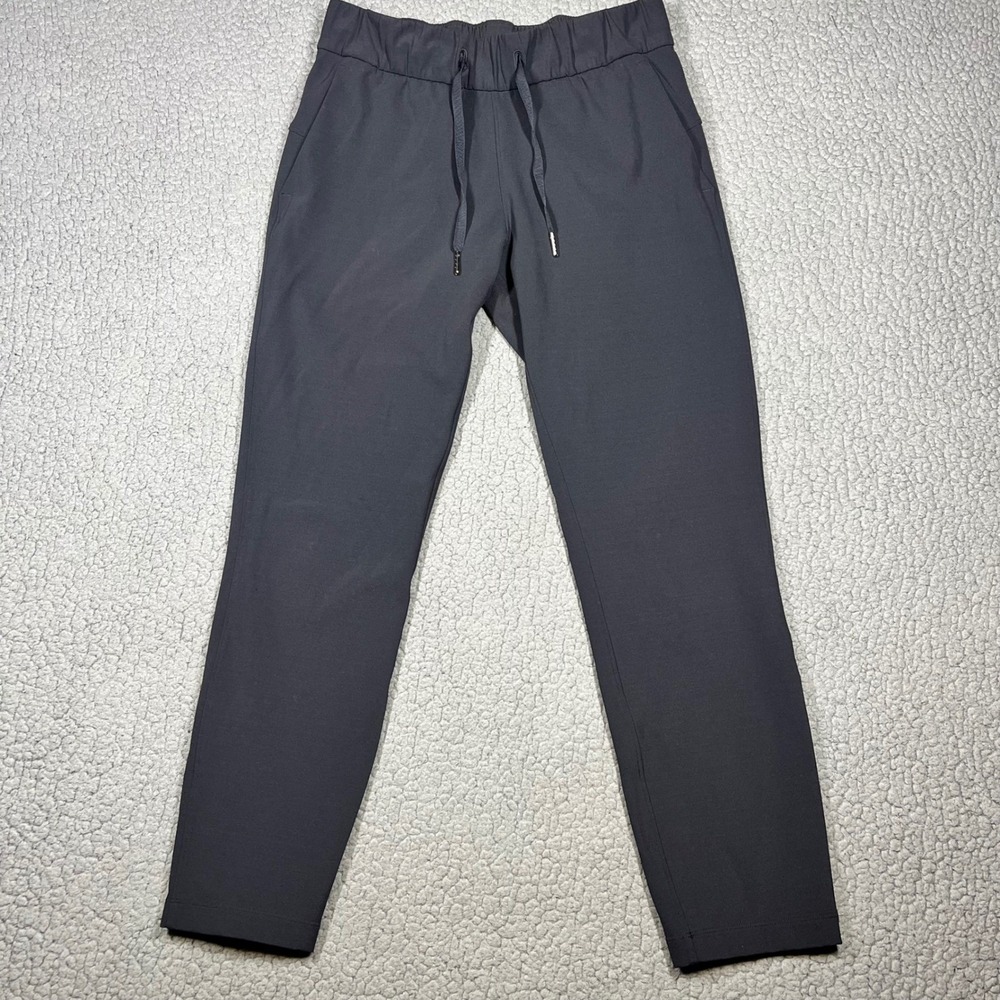 Lululemon On the Fly 7/8 Tapered Joggers Black Luxtreme Pants Size 4 LW5BLPS